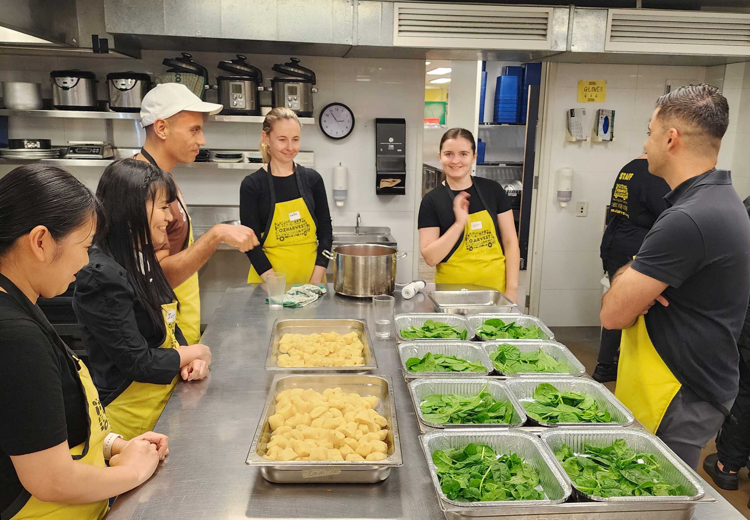 Atmos's Sydney staff volunteer to cook meals at Oz Harvest