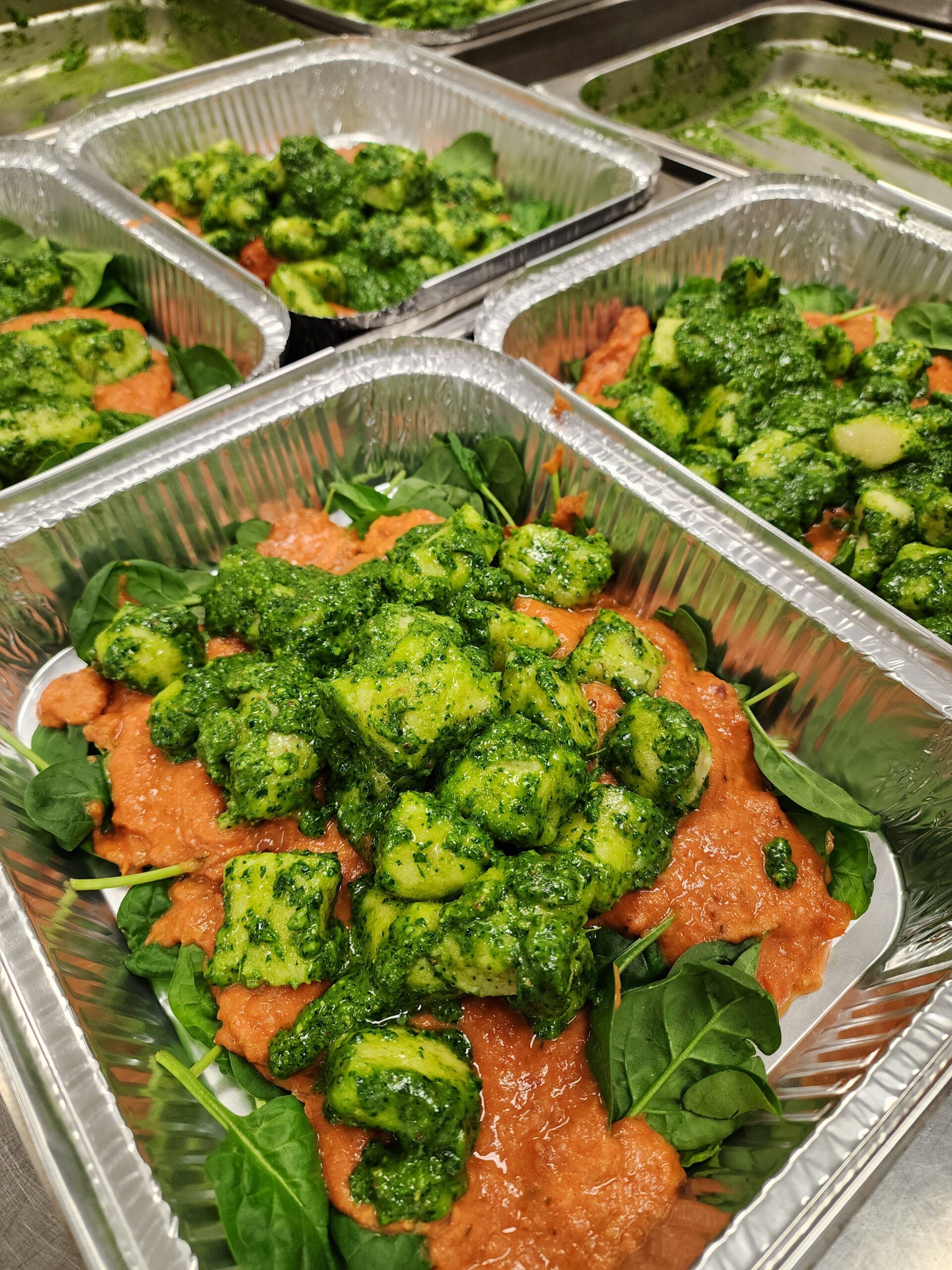 Atmos's Sydney staff volunteer to cook meals at Oz Harvest
